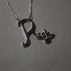 silver music necklace